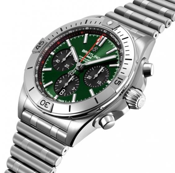 The stainless steel fake watch has green dial.